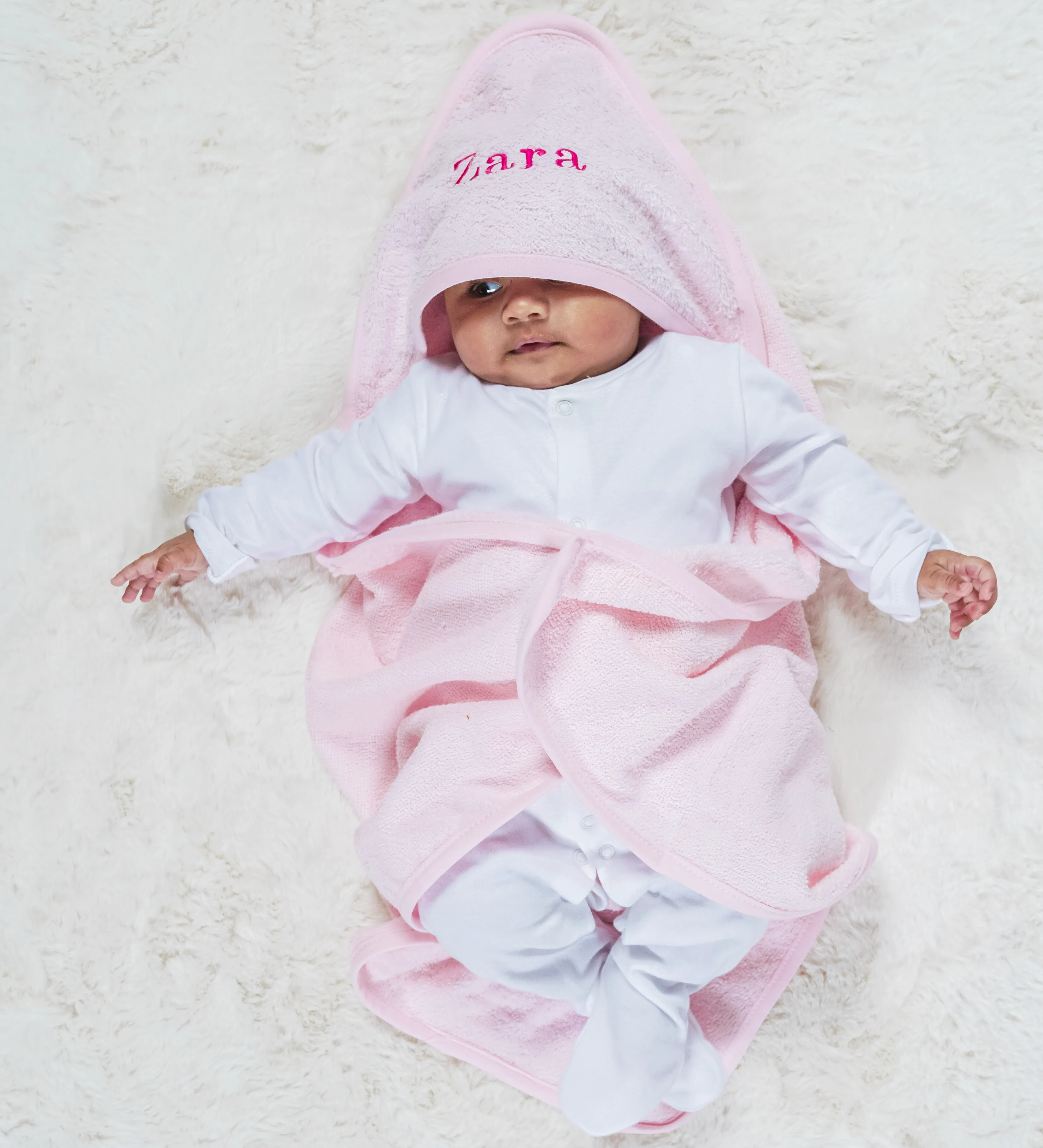 Babies personalised plain hooded towel/robe Light Pink