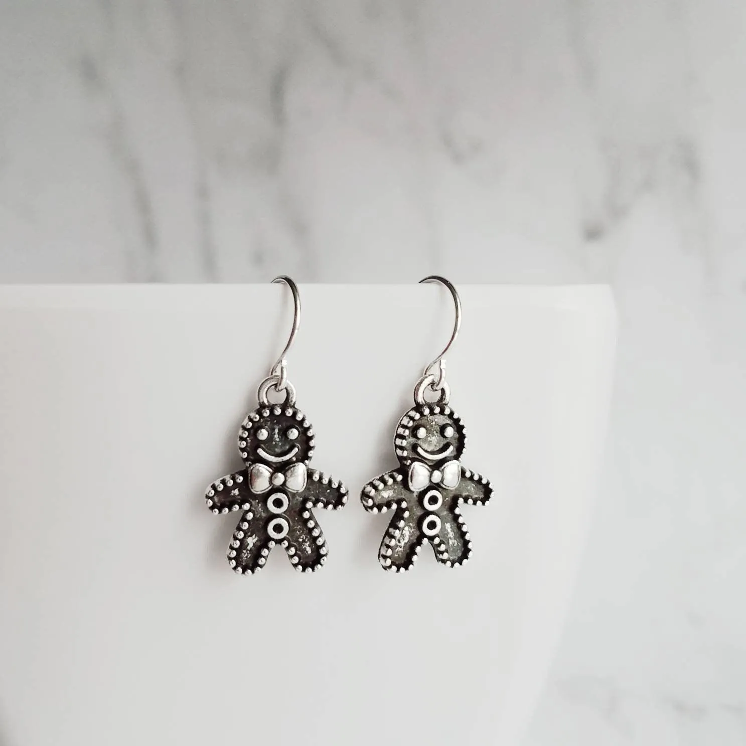 Gingerbread Men Earrings, silver Christmas earring, cookie earring, gingerbread earring, antique silver Xmas earring, bow tie gingerbread