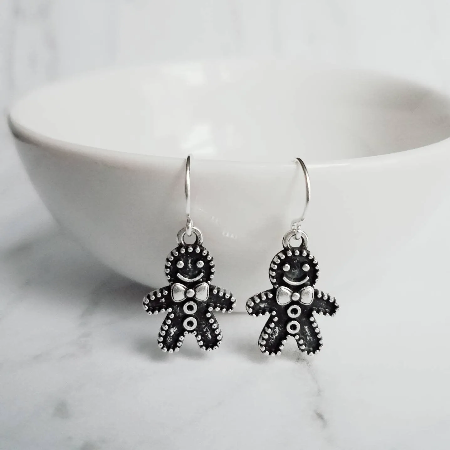 Gingerbread Men Earrings, silver Christmas earring, cookie earring, gingerbread earring, antique silver Xmas earring, bow tie gingerbread