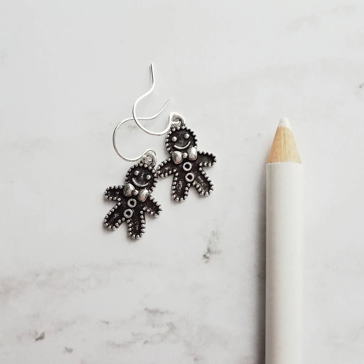 Gingerbread Men Earrings, silver Christmas earring, cookie earring, gingerbread earring, antique silver Xmas earring, bow tie gingerbread
