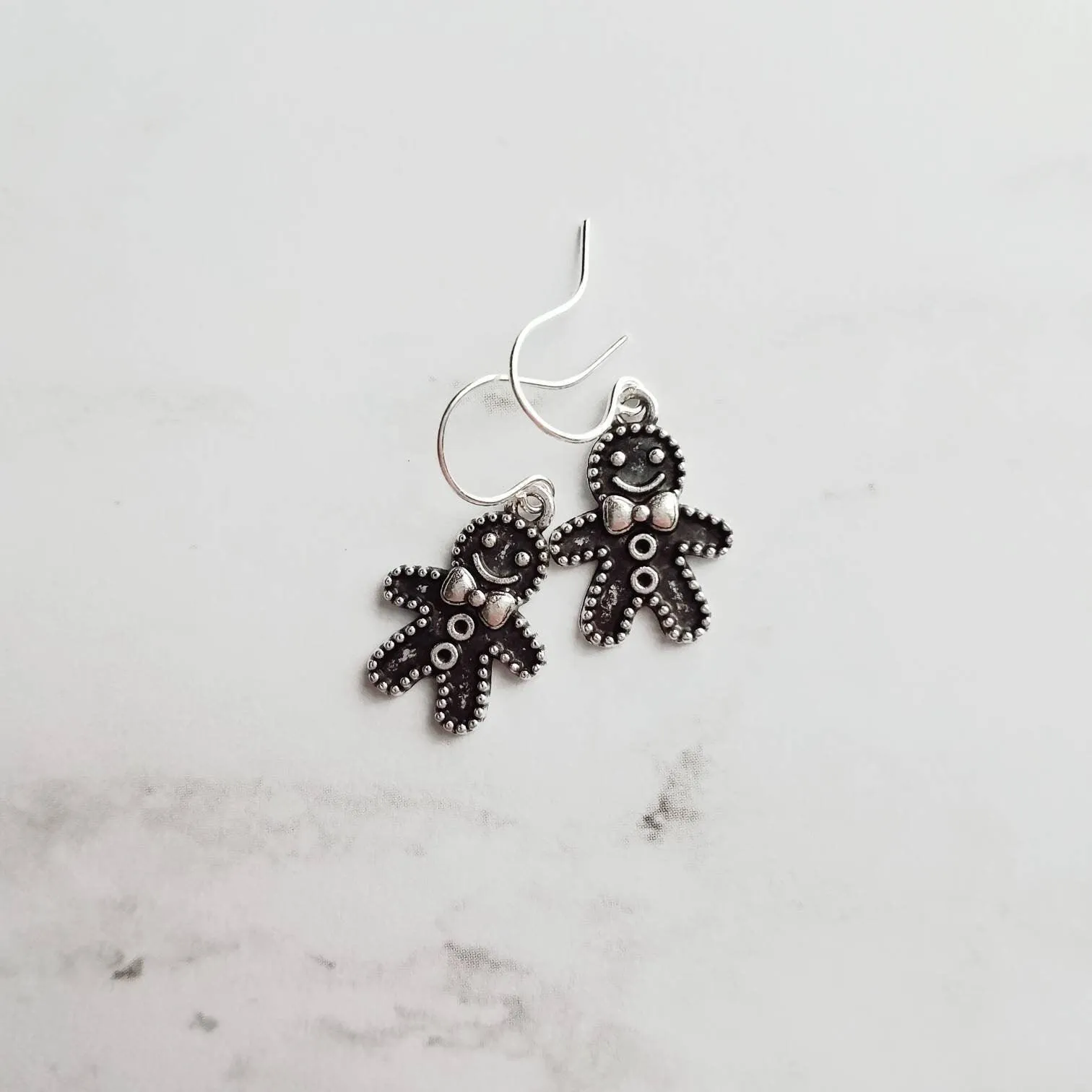 Gingerbread Men Earrings, silver Christmas earring, cookie earring, gingerbread earring, antique silver Xmas earring, bow tie gingerbread