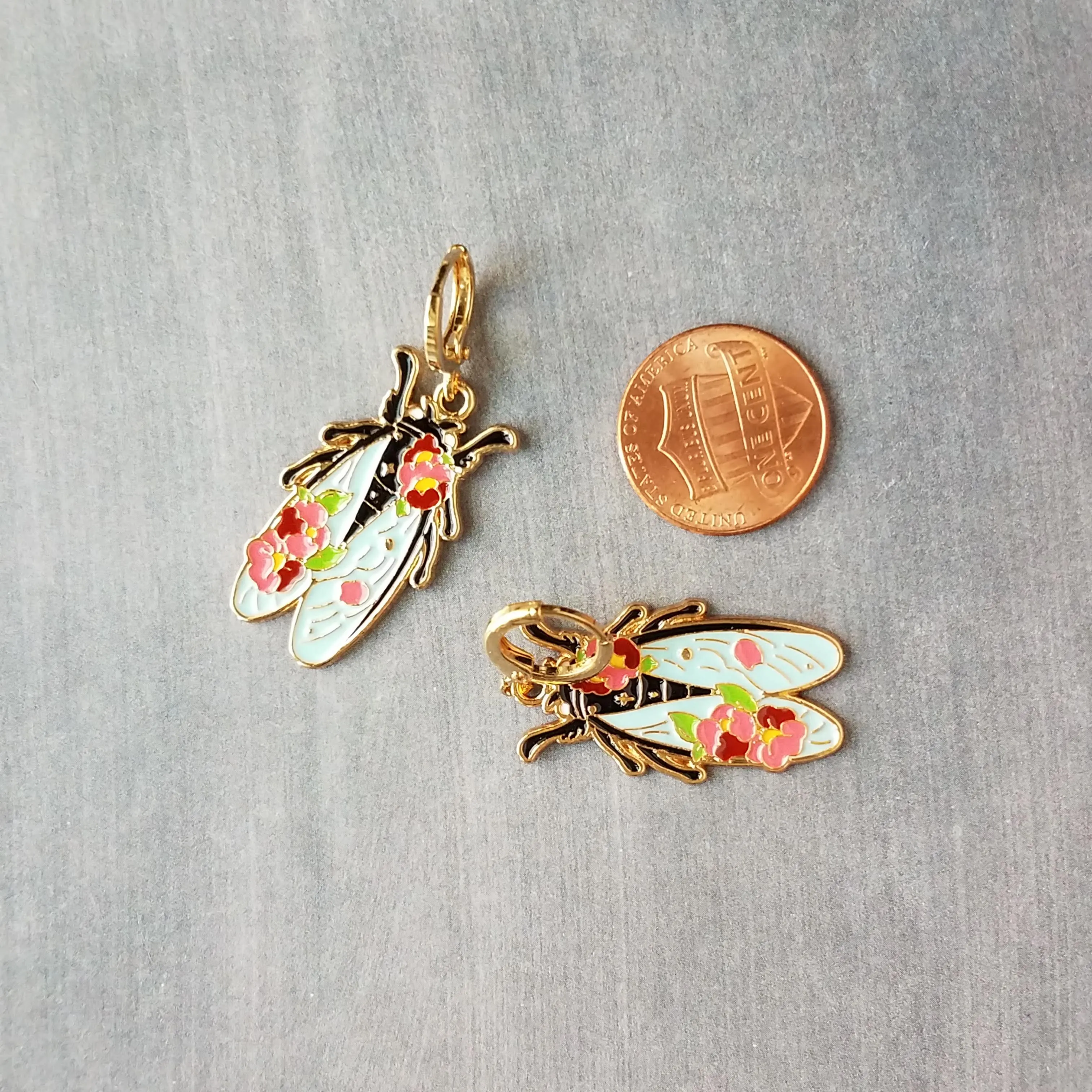 Insect Earrings, flying insect dangles, bug jewelry, gold huggie hoop, pink flowers on insect, insect jewelry, black enamel bug, fly earrings, snap close hoop, flying insect with blue wings