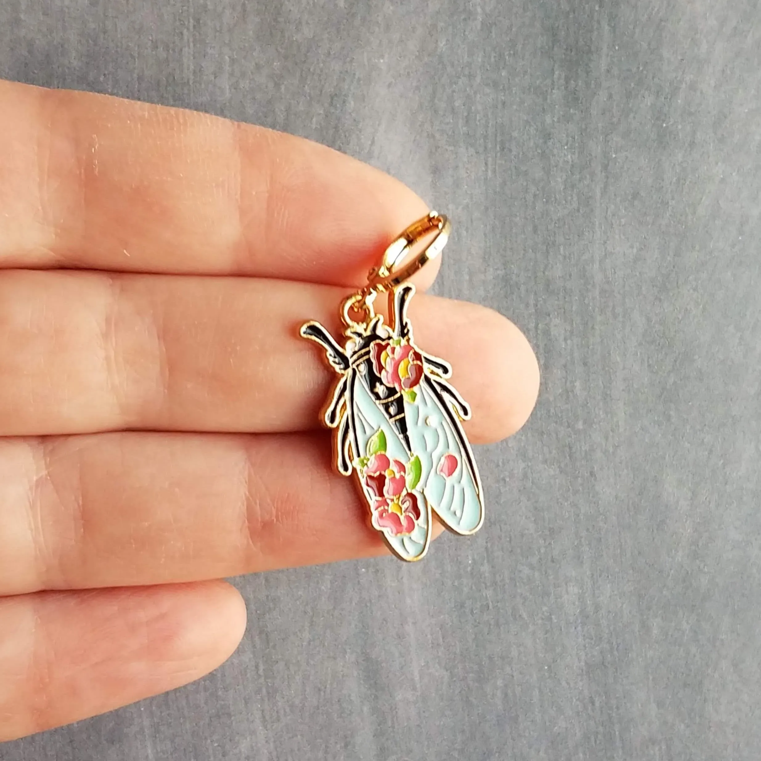Insect Earrings, flying insect dangles, bug jewelry, gold huggie hoop, pink flowers on insect, insect jewelry, black enamel bug, fly earrings, snap close hoop, flying insect with blue wings