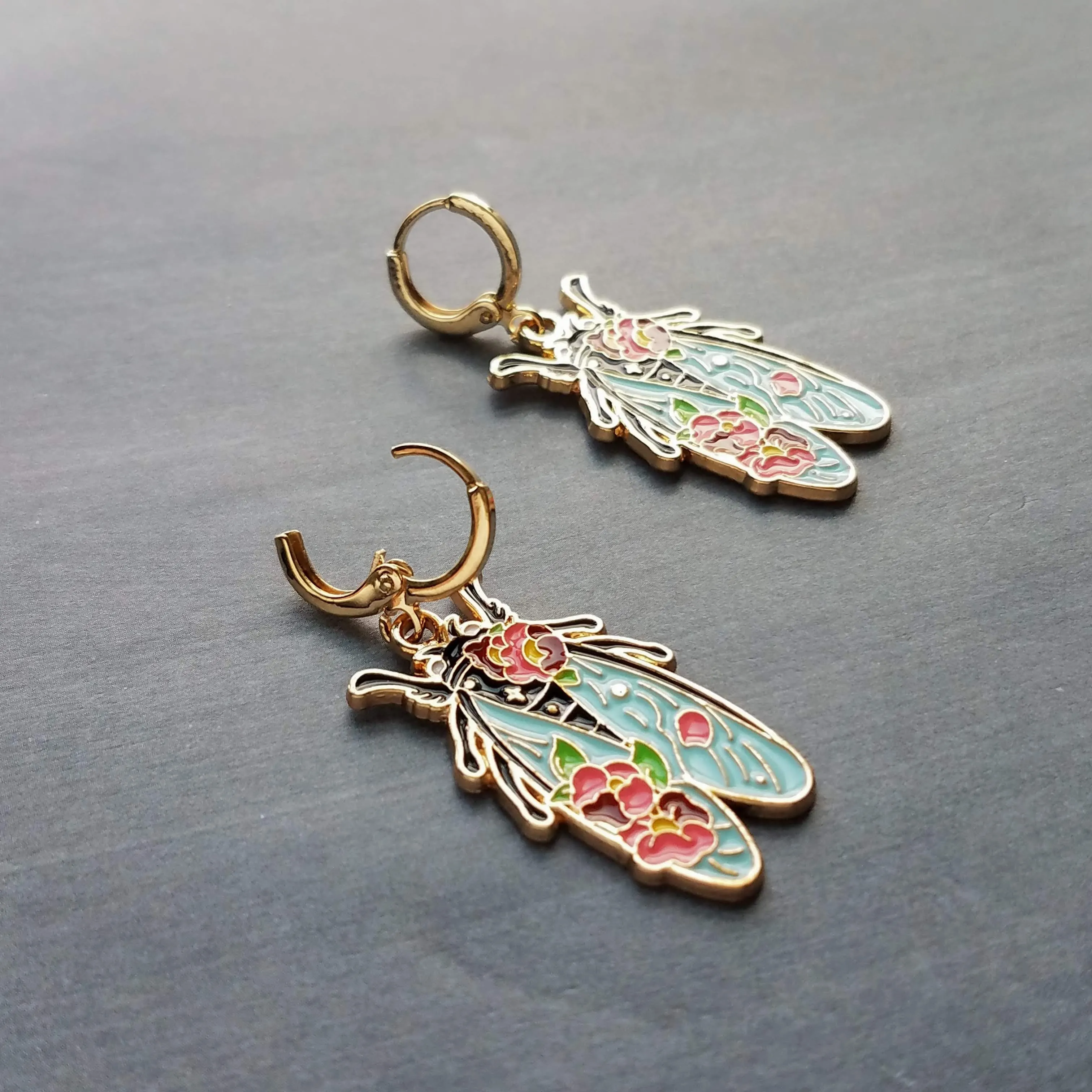 Insect Earrings, flying insect dangles, bug jewelry, gold huggie hoop, pink flowers on insect, insect jewelry, black enamel bug, fly earrings, snap close hoop, flying insect with blue wings